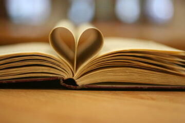 Book with pages formed into heart